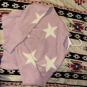 Cropped sweater it’s a light pink, it’s  a large only worn one time